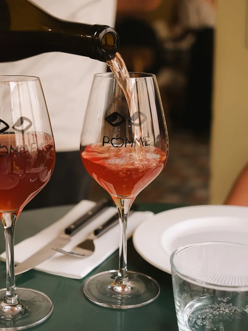 Wine being poured into a glass